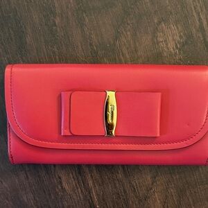 Chic Red Ferragamo Leather Wallet with Bow Accent